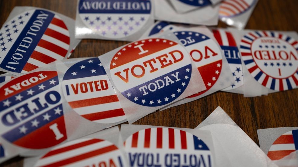 LITTLE CHUTE, WISCONSIN - NOVEMBER 01:  Stickers sit on a table during in-person absentee voting on November 01, 2024 in Little Chute, Wisconsin. Election day is Tuesday November 5. (Photo by Scott Olson/Getty Images)