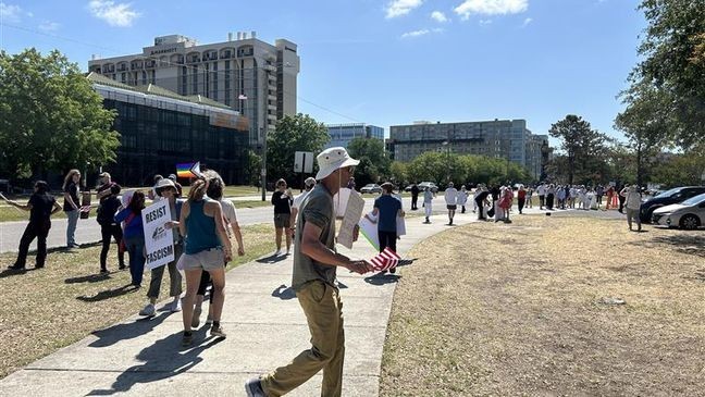Protestors gathered in downtown Charleston Saturday to protest the Trump administration in the Lowcountry's second 50501 national day of action protest. (Cameron Limes/WCIV)