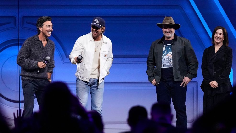 Film director Shawn Levy, left, and actor Ryan Gosling have a light moment on stage with director Dave Filoni and film producer Kathleen Kennedy during a fan convention called the Star Wars Celebration in Chiba, near Tokyo, Friday, April 18, 2025. (AP Photo/Hiro Komae)